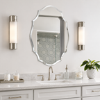 Frameless bevelled shield shaped wall mirror