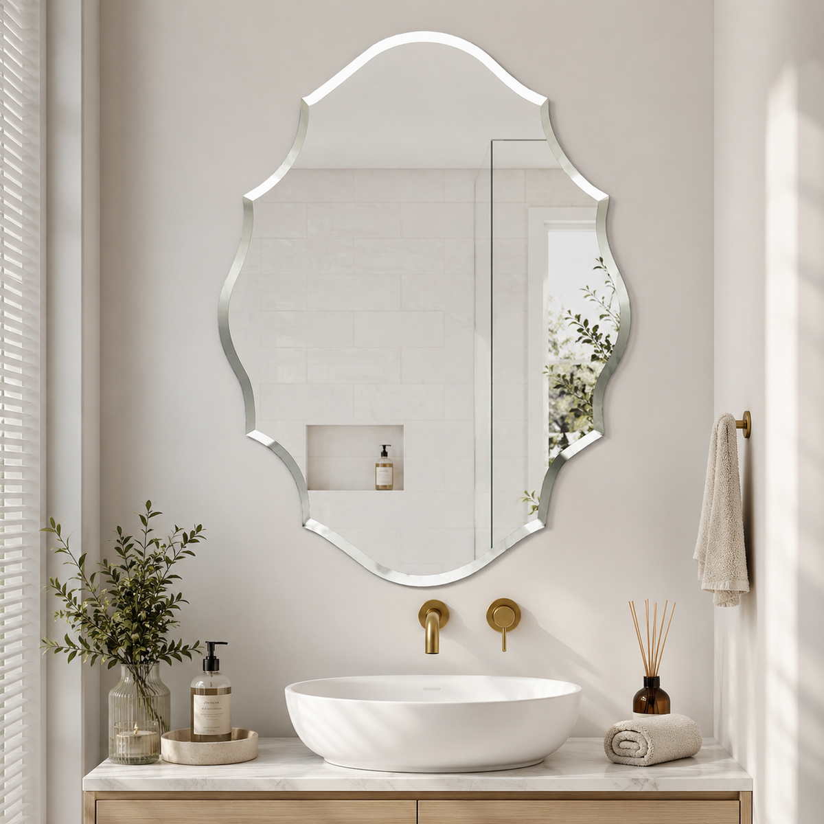 Frameless bevelled shield shaped wall mirror